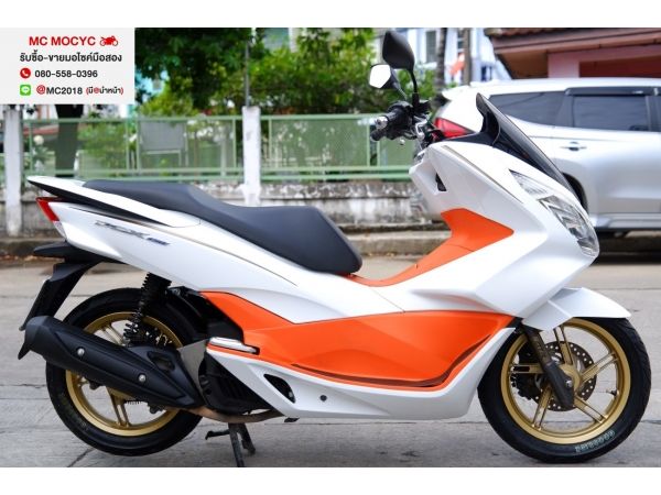 pcx ขาวส้ม ชุดสีสดสวยมาก ไม่มีรอยล้มชน มีเล่มชุดโอนครบ ภาษีไม่ขาด รูปที่ 0